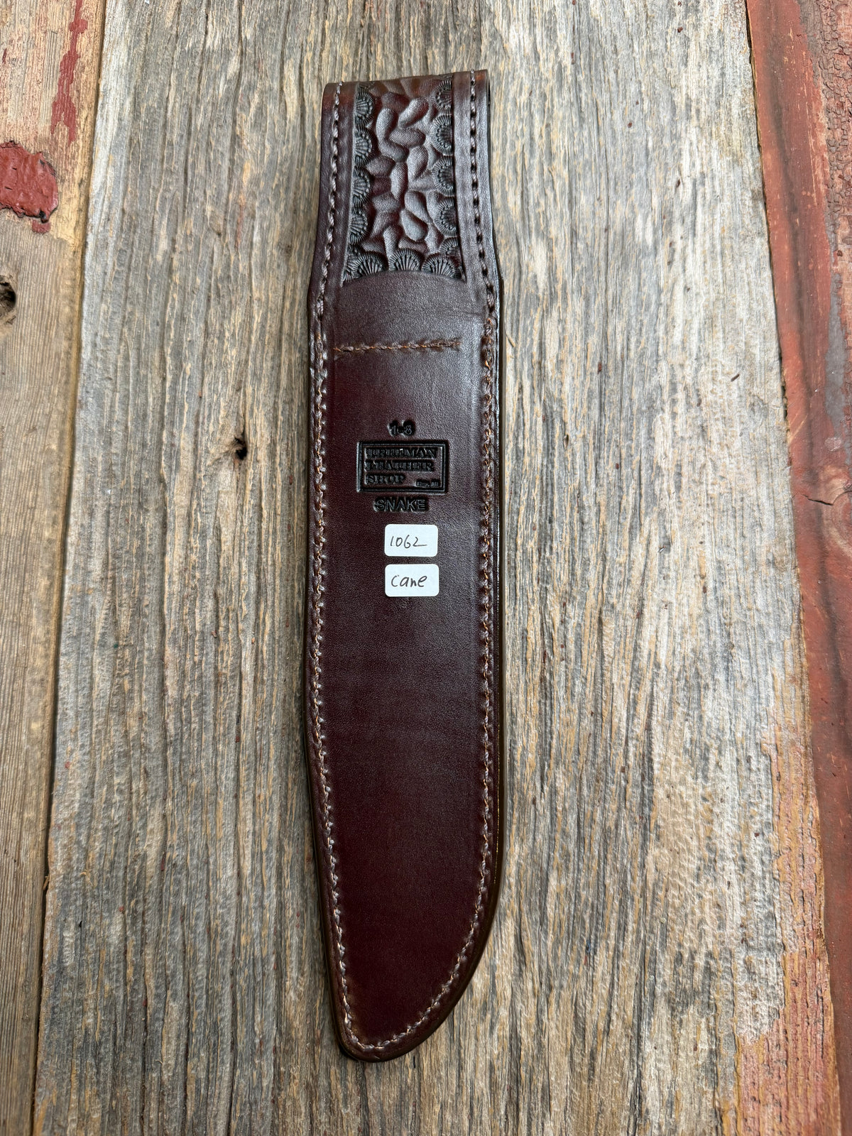 Randall Model 1-8 sheath with a Canebrake RattleSnake skin from Treeman Sheaths. Vibrant colors and along side Copperheads the hardest skin to source.