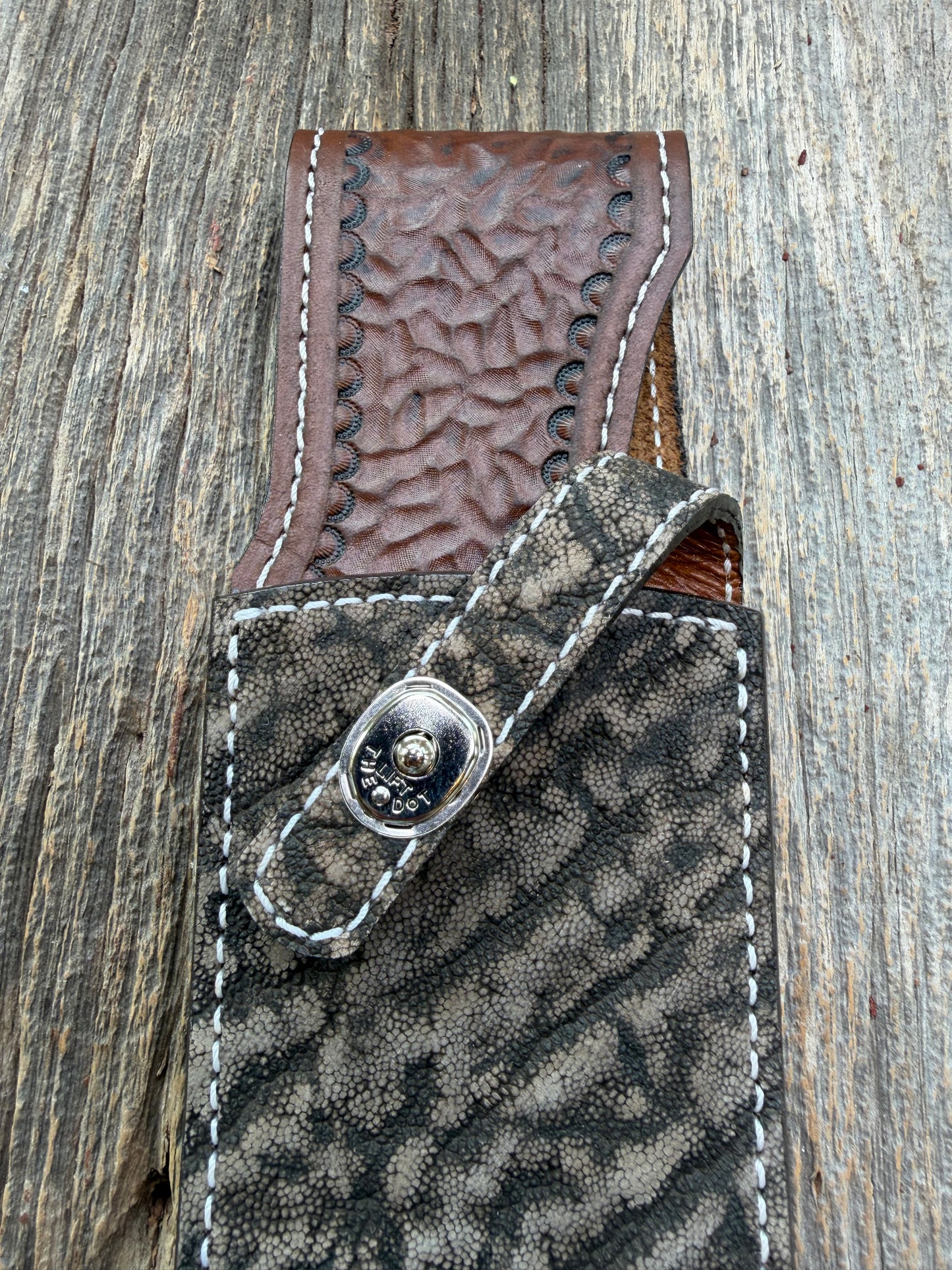 New Randall Model 12-11 Large Sasquatch Sheath in Exotic thick and textured Black and Grey Elephant Ear  on brown leather from Treeman with a silver Canteen snap. Hand tooled belt loop. Killer sheath.