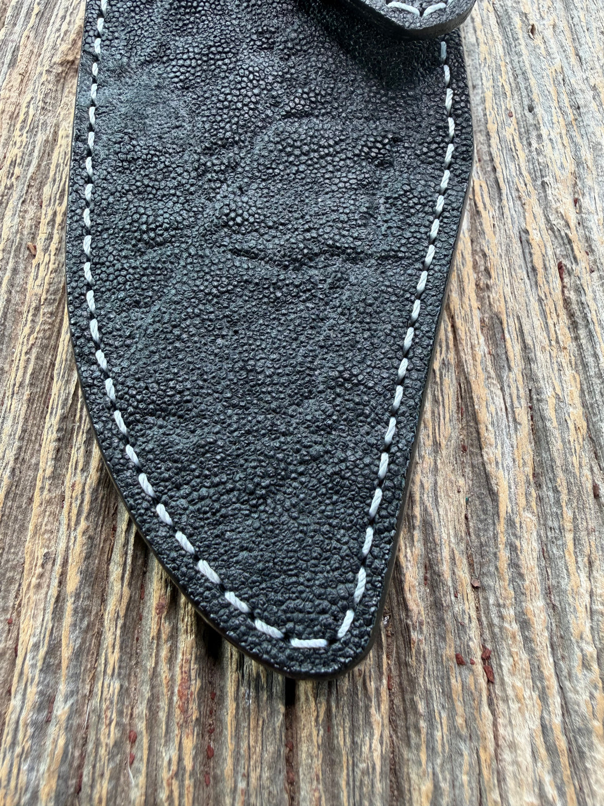 New Randall Model 19-5 Sheath in Exotic Black Matte Elephant Hide from Treeman with a Black Canteen snap. White thread deviated stitching on black leather..Killer sheath.