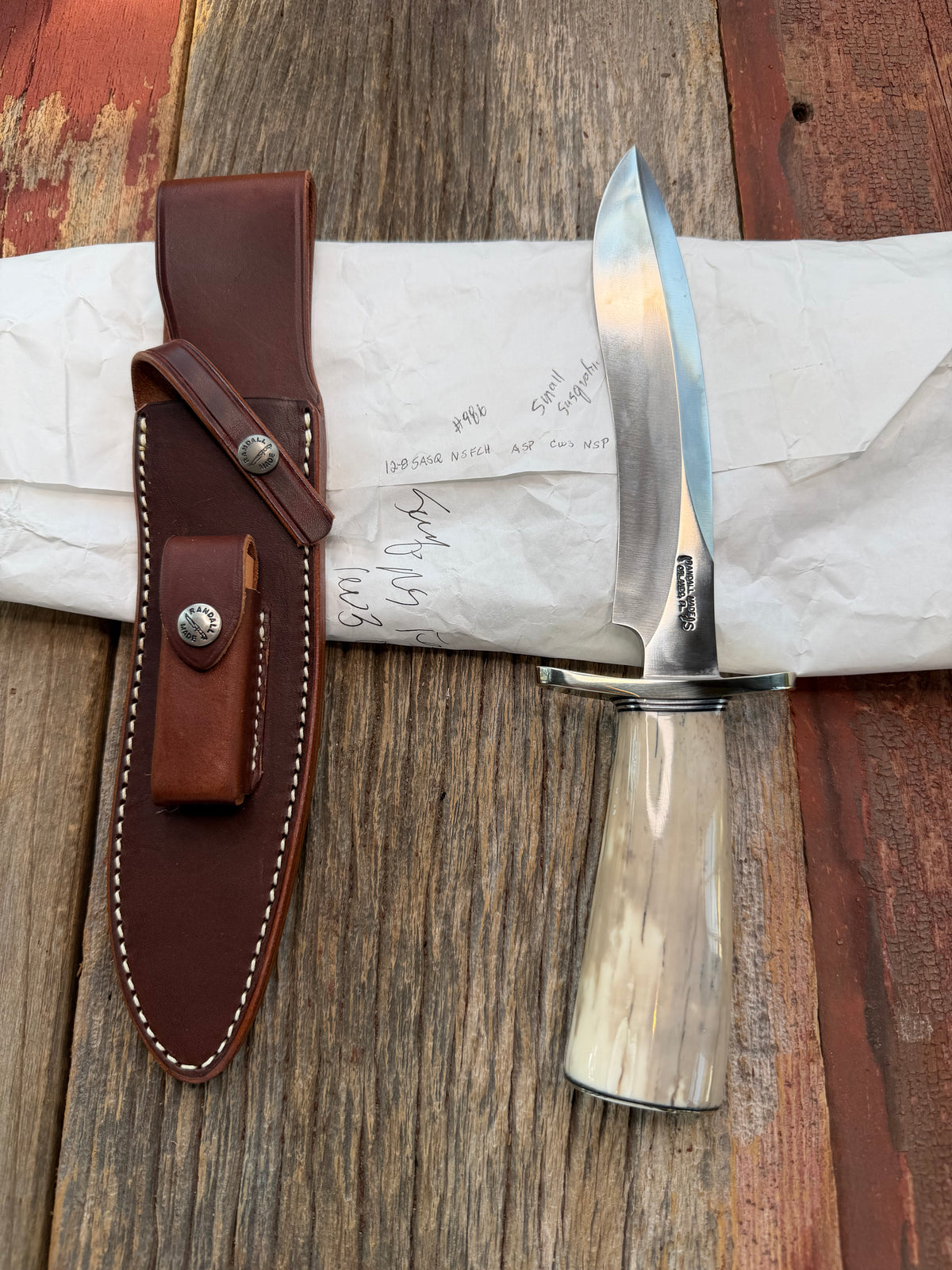 New in Paper Randall Model 12-8 Small Sasquatch with a nice piece of Fossil Walrus Ivory, Nickel Silver Hilt and butt plate.