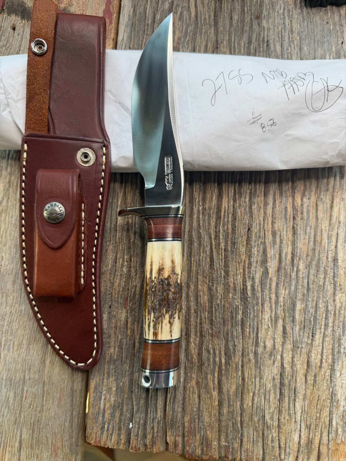 New in Paper Randall Made Knife Model 27-5 with a 25 style Stag handle, stainless, Nickel silver single Hilt, black and aluminum spacers, Aluminum  butt cap with Lanyard hole, loaded!!