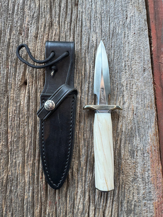 Rare Randall Model 2-4 in Beautiful Spiraled Narwal, Nickel Silver hilt and butt plate. Stainless steel, Stunning and rare.