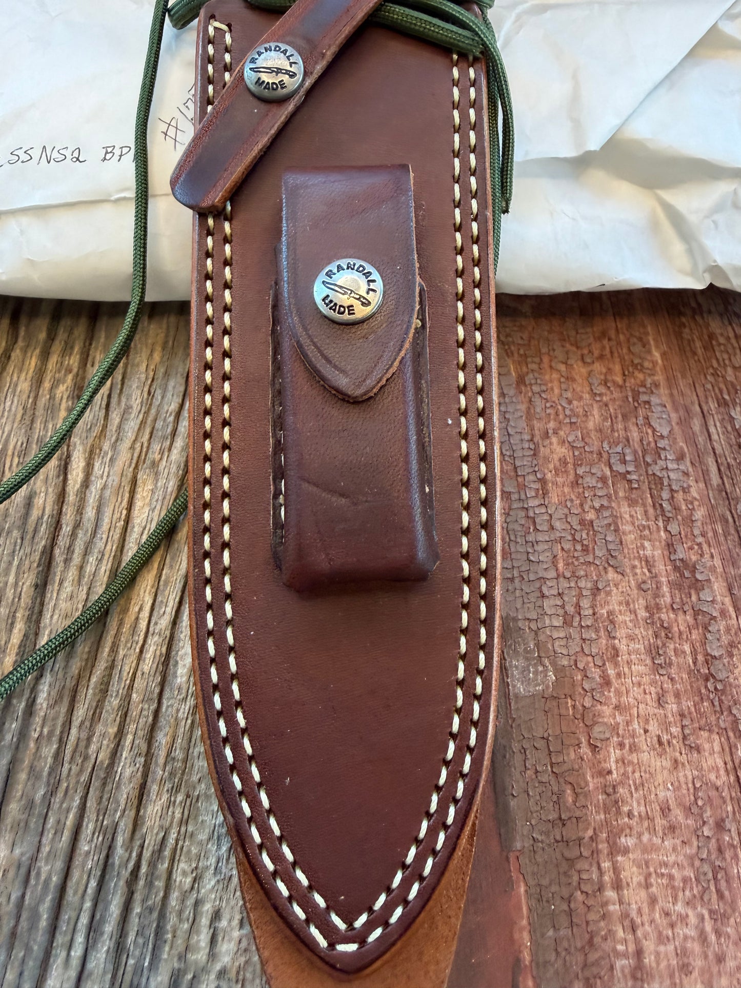 New in Paper Randall Model 14-7.5 in Black Micarta handle, Nickel Silver Hilt, Stainless steel, and Lanyard.