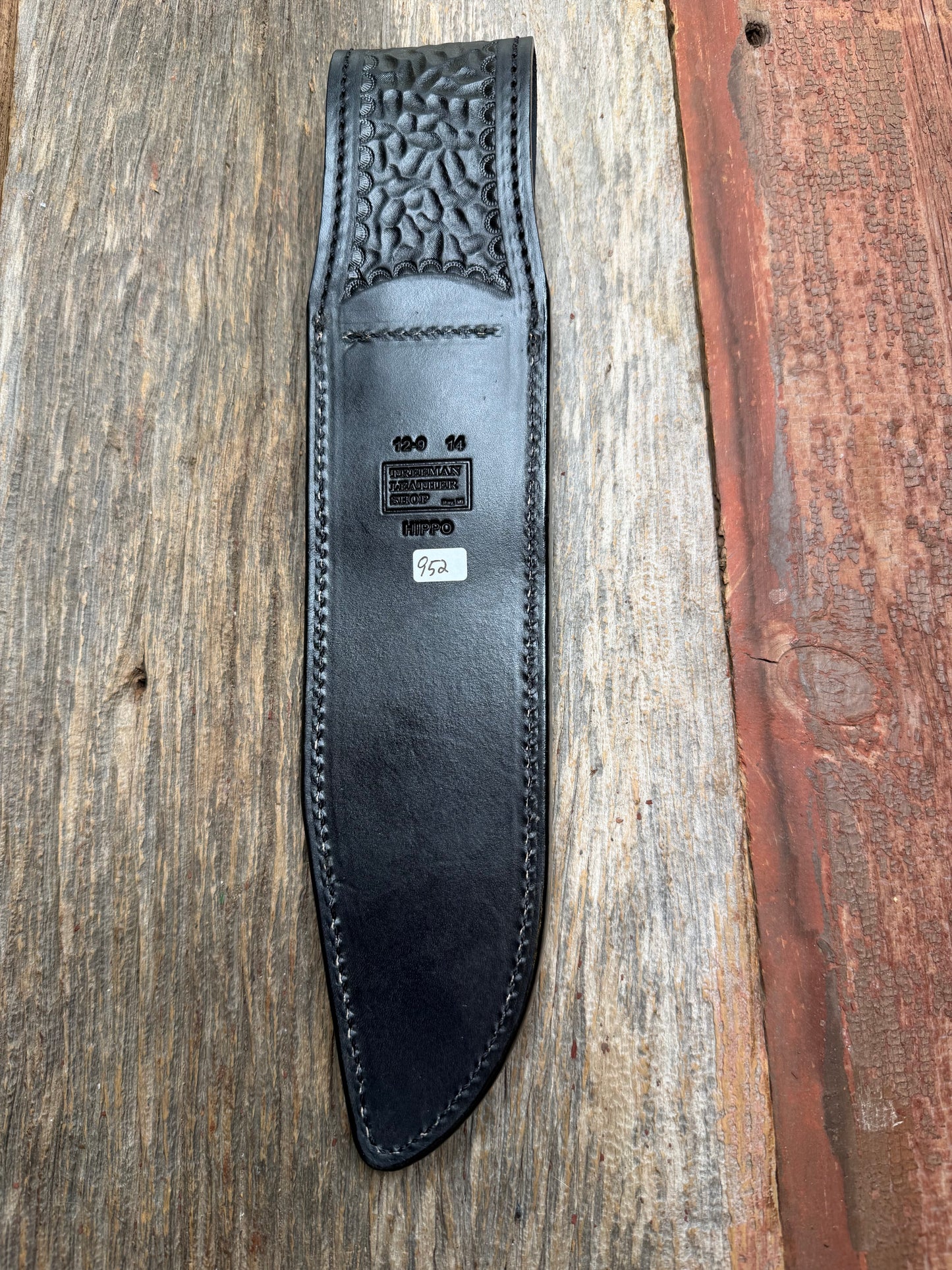 Randall Model 12-9 in Black Hippo, forward curved hilt, black Canteen Snap, full brass stamping and stitching.