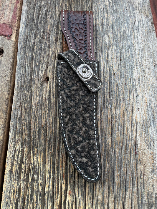 New Randall Model 27 Sheath in Exotic thick and textured Black and Grey Elephant Ear  on brown leather from Treeman with a silver Canteen snap. Hand tooled belt loop. Killer sheath.