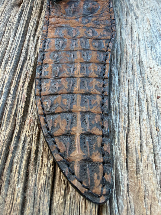 New Randall Model 12-8 Big Bear Sheath in Exotic Dark Brown Sueded Crocodile ( Skull and Hornback) from Treeman with the newest Black Canteen snap.