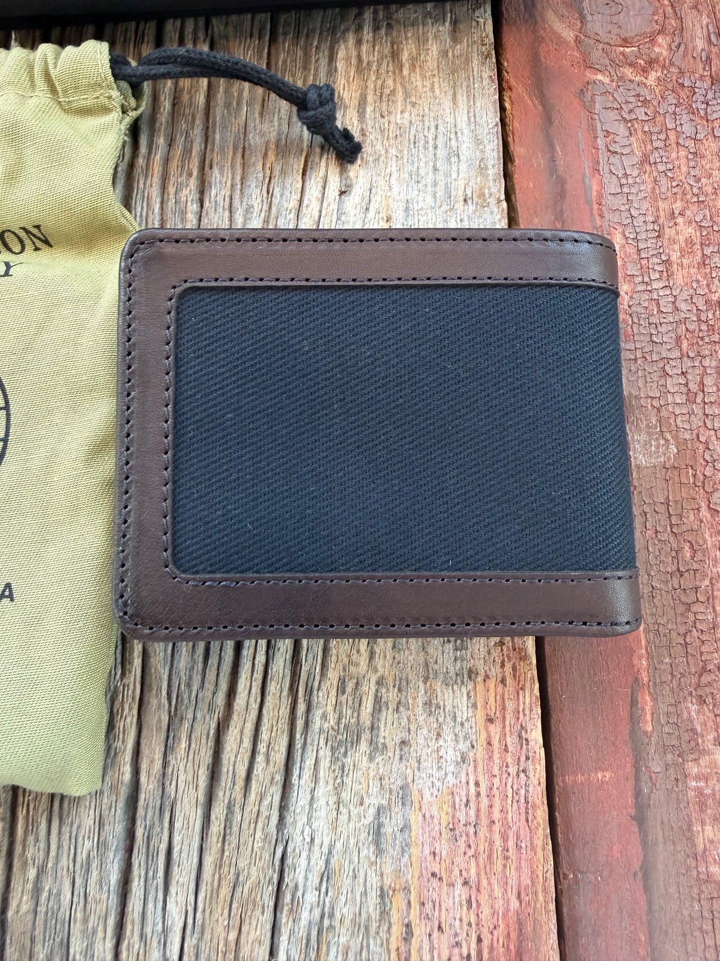 New in Box Filson Outfitter Leather Wallet in Black Twill USA 20187879 Discontinued long ago.