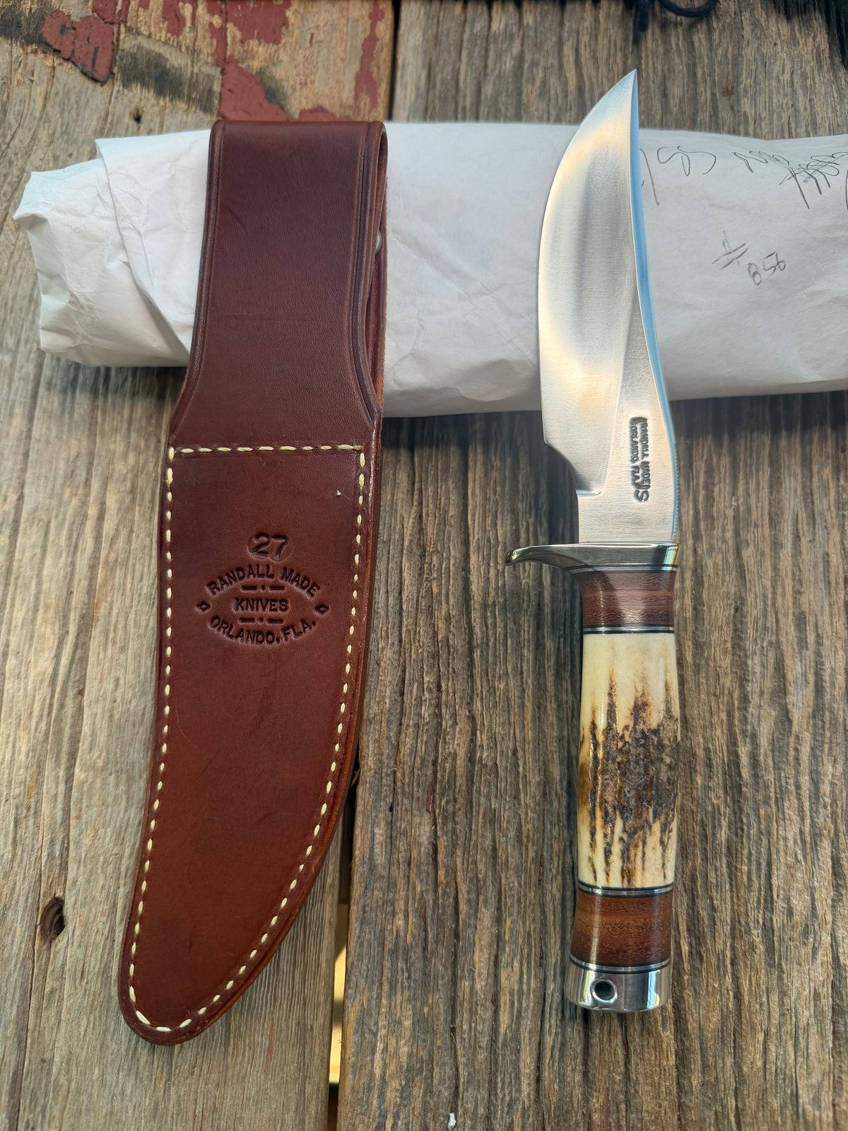 New in Paper Randall Made Knife Model 27-5 with a 25 style Stag handle, stainless, Nickel silver single Hilt, black and aluminum spacers, Aluminum  butt cap with Lanyard hole, loaded!!
