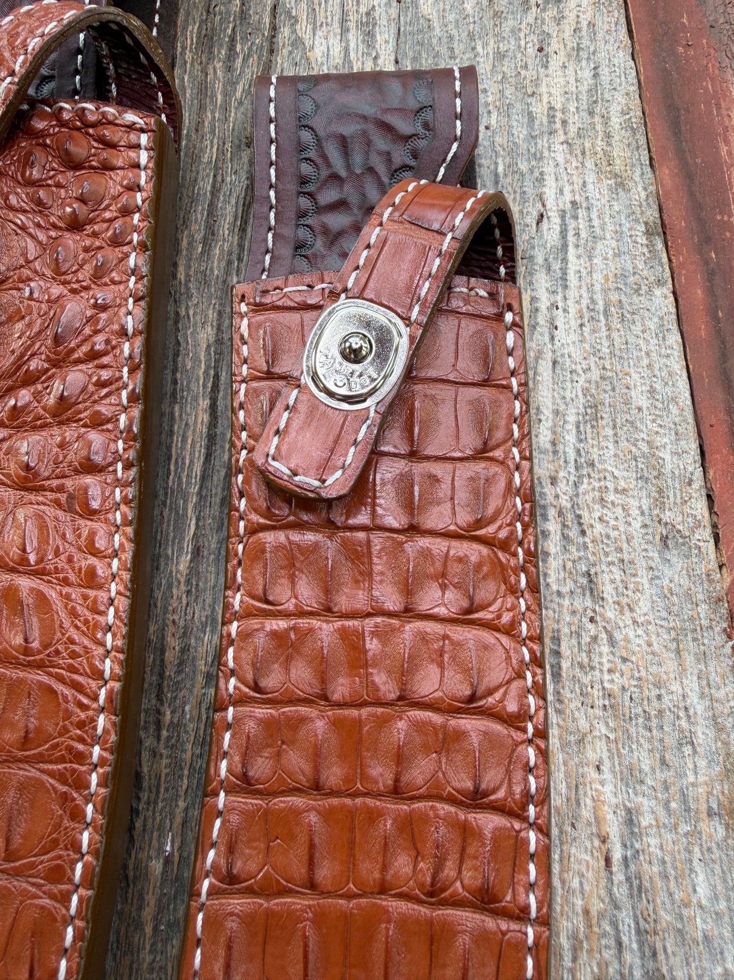 Pair of new Randall Model 12-11 Large and Small Sasquatch Sheaths in Exotic thick and textured Honey Crocodile skin ( skull portion) on brown leather from Treeman with a silver Canteen snap. Hand tooled belt loop. Killer sheath.
