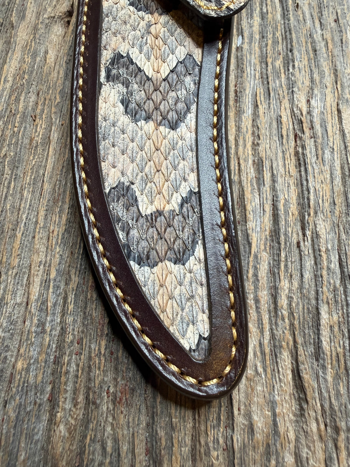 Randall Model 27 sheath with a Canebrake RattleSnake skin from Treeman Sheaths. Vibrant colors and along side Copperheads the hardest skin to source.