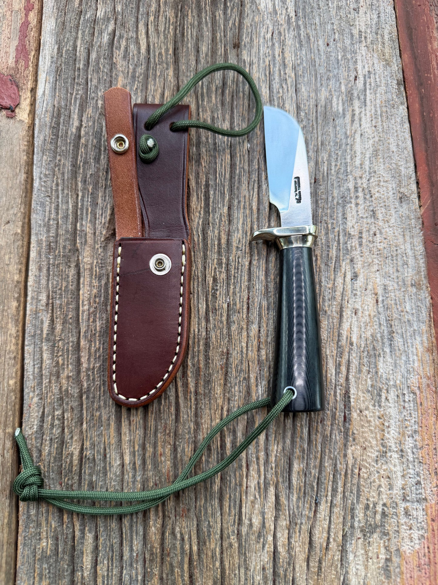 New Randall Non Catalog Model  Cattleman. Black Micarta handle. Nickel silver single hilt and collar. Stainless blade.