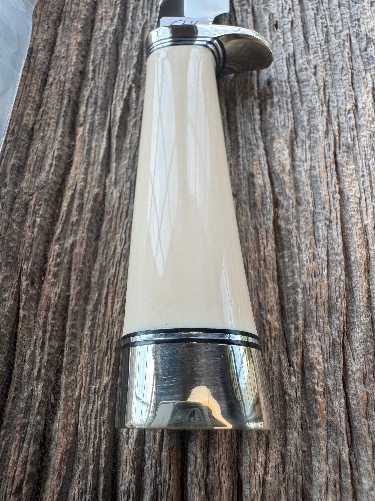 New in paper Randall Model 8-4 with a nice piece of customer supplied Dave Warthers Resin, Stainless Steel, Nickel Silver Single Hilt and butt cap.