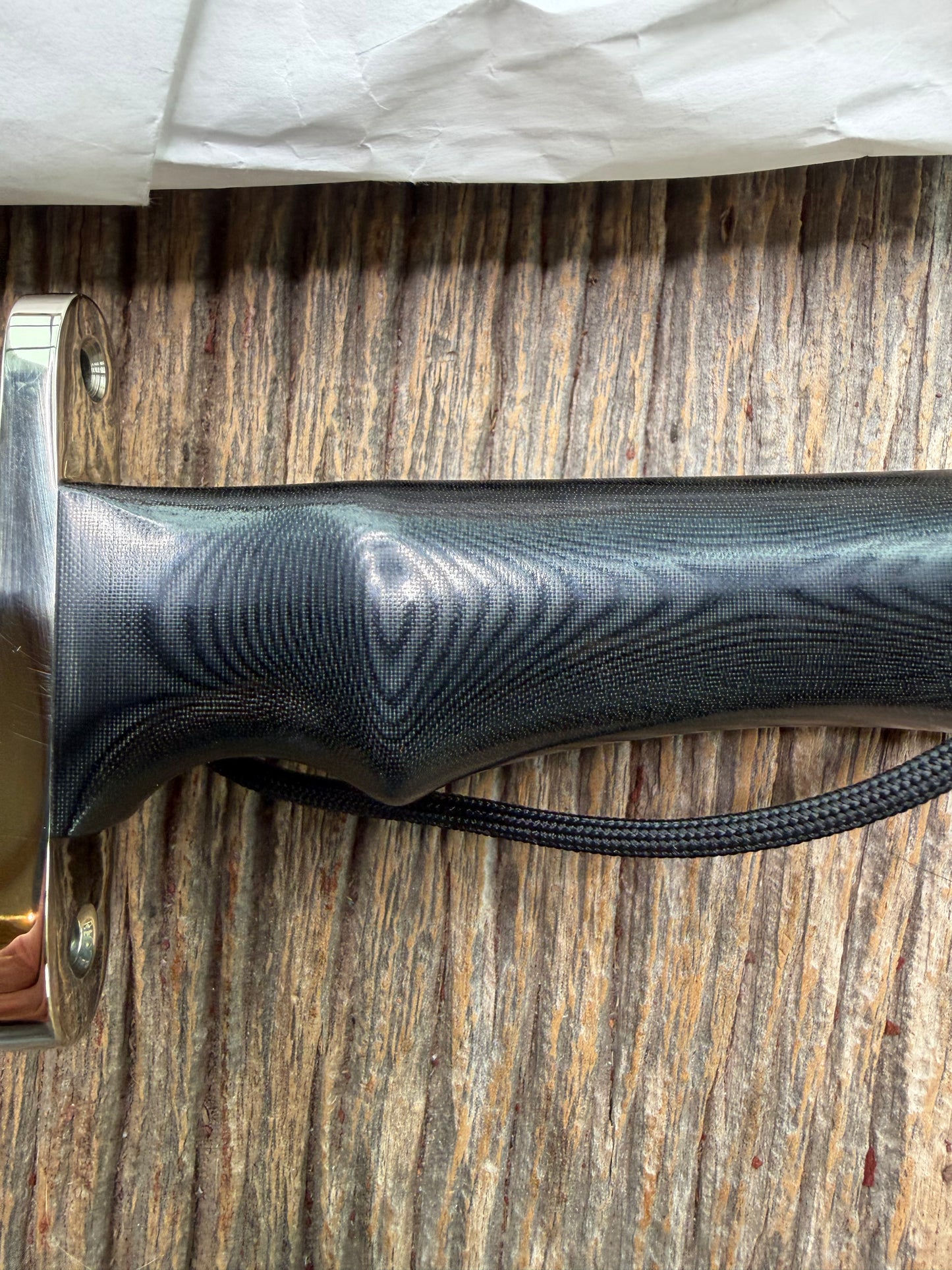 New in Paper Randall Model 16 SP#1 Special fighter with a Black Micarta handle. SS blade, Nickel silver Double hilt. Lanyard. Brown leather sheath.
