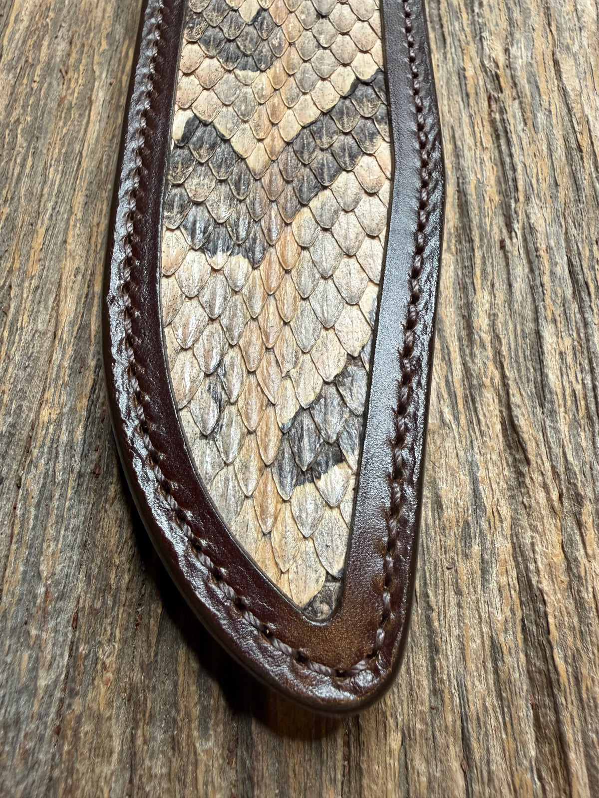 Randall Model 14 sheath with a Canebrake RattleSnake skin from Treeman Sheaths. Vibrant colors and along side Copperheads the hardest skin to source.