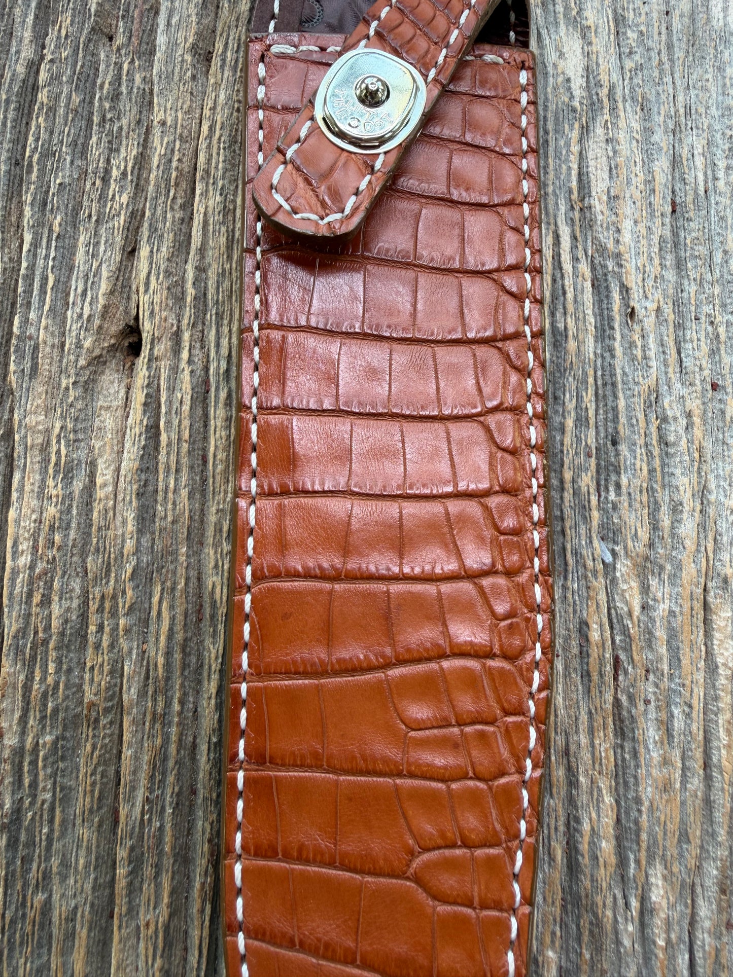 New Randall Model 1-8 Sheath in Exotic thick and textured Honey Crocodile skin on brown leather from Treeman with a silver Canteen snap. Hand tooled belt loop. Killer sheath.
