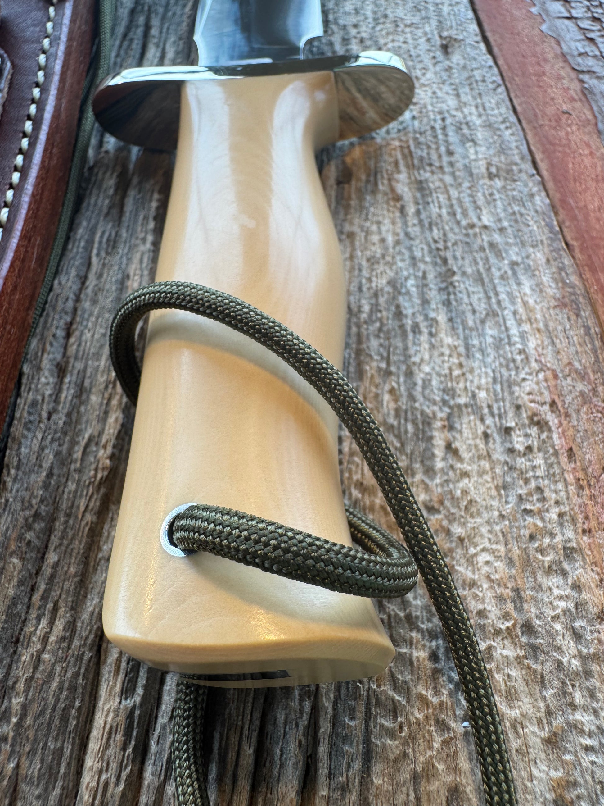 Randall Model 16-7 in Tan Micarta. Nickel Silver Hilt, Stainless steel and Lanyard. New in Paper.