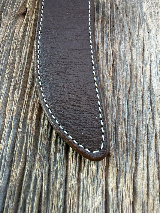 New Randall Model 4-7 Sheath in Exotic Brown Cape Buffalo with full leather hand tooled belt loop. Randall snap and stamp on the back. Custom Made at Sullivan’s by Gutcher