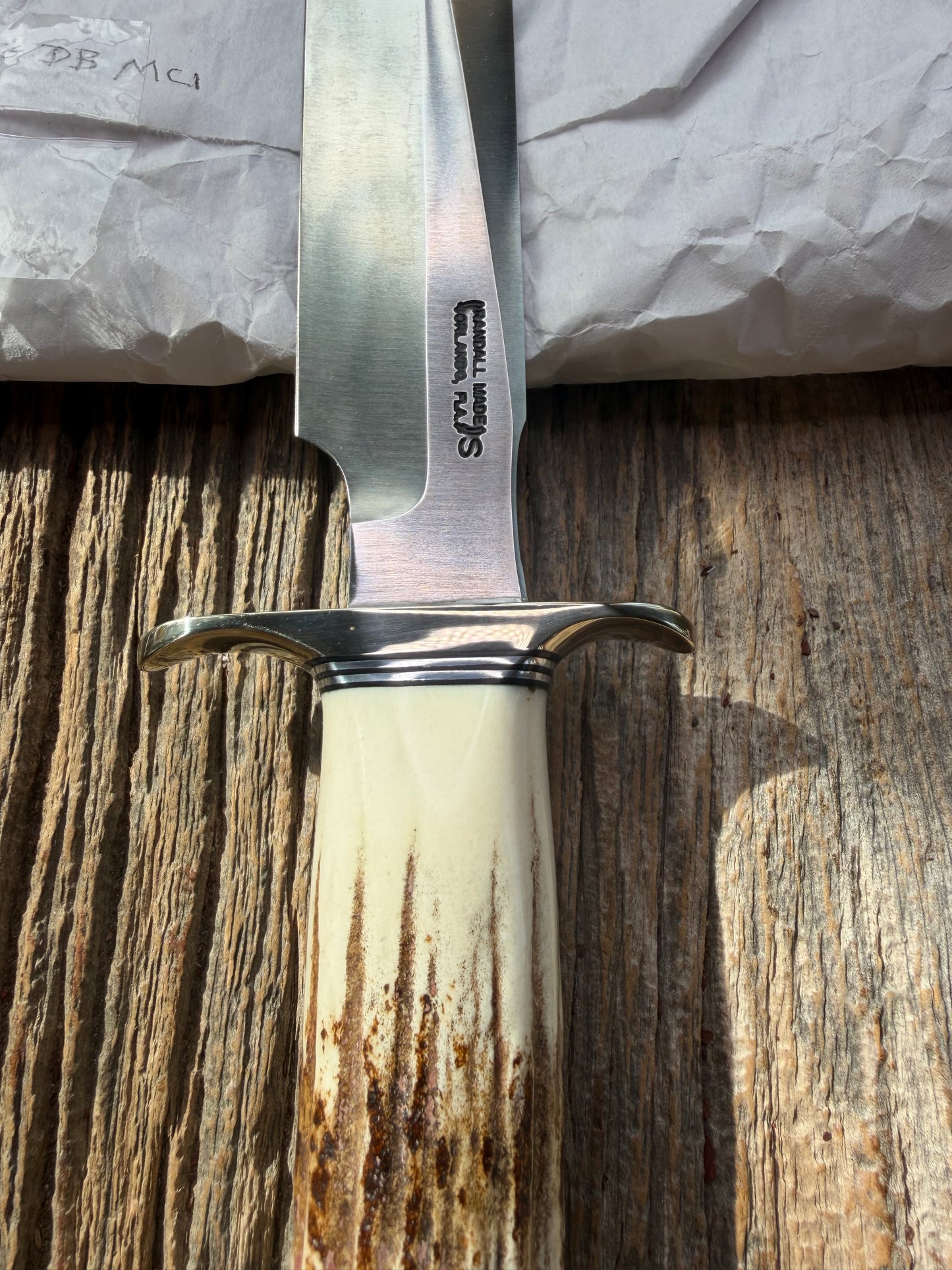 New in Paper Randall Made Knife Model 1-7 Stag , Stainless, Black and Aluminum spacers, Nickel Silver Hilt, Aluminum butt cap.