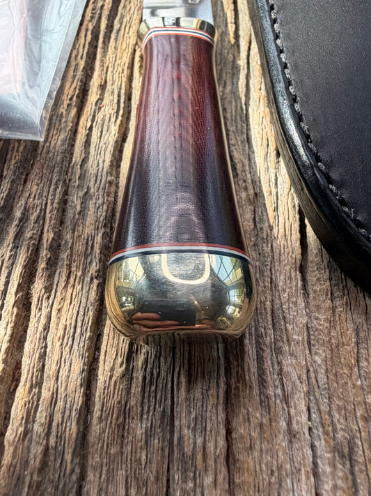 New in Paper Randall Model “Gambler” 4 Inch in a Maroon Micarta handle, Nickel hilt, Stainless steel blade, rounded nickel silver butt cap.