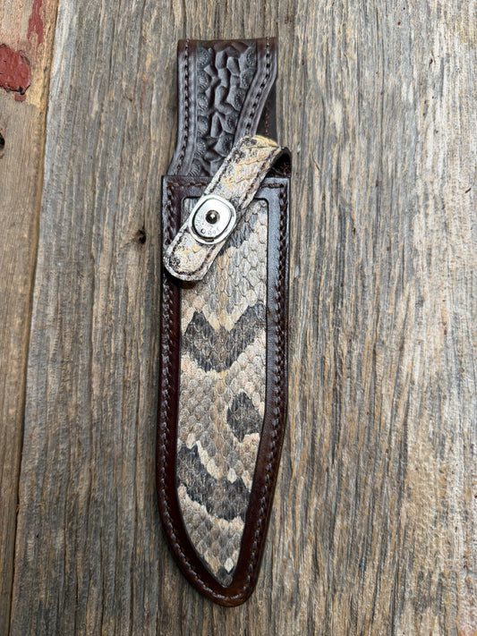 Randall Model 1-7 sheath with a Canebrake RattleSnake skin from Treeman Sheaths. Vibrant colors and along side Copperheads the hardest skin to source.
