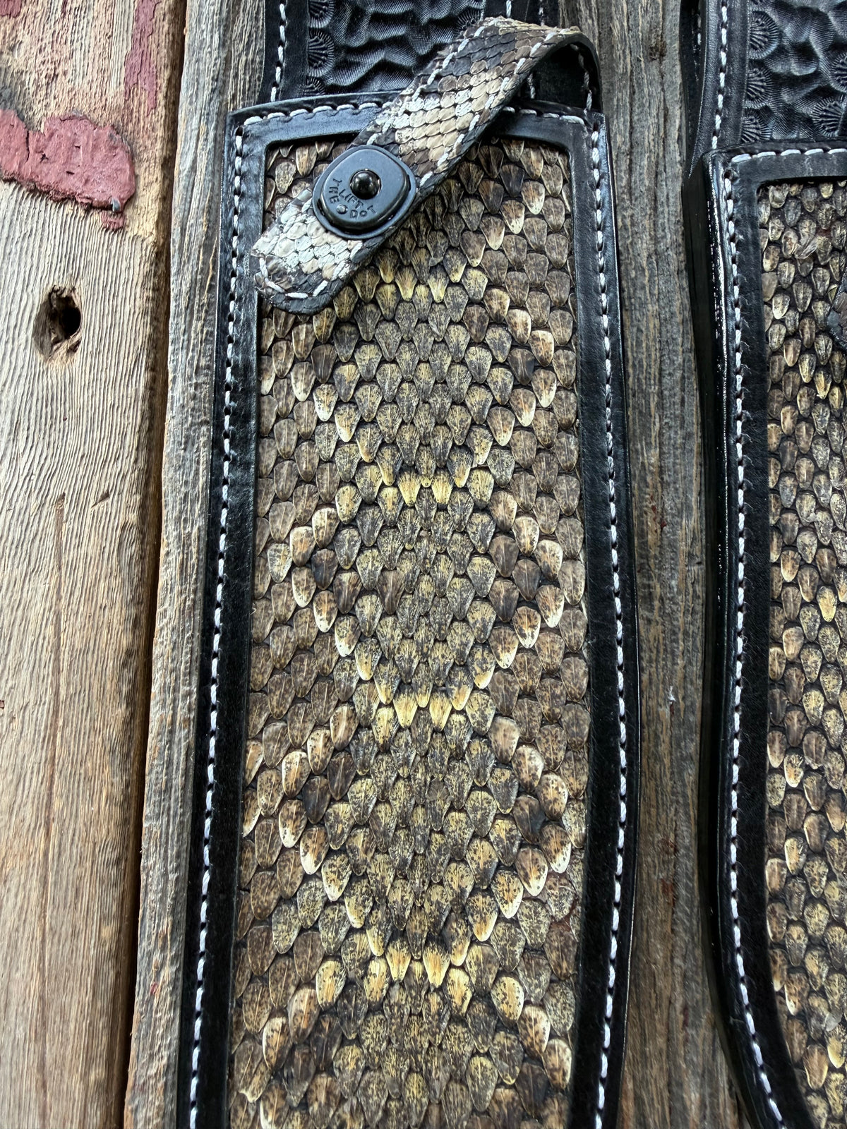 Randall Model Large Sasquatch and Small Sasquatch sheath pair with inlayed Western Diamondback RattleSnake skins from Treeman Sheaths. Very dark skins on brown leather, white deviated stitching and black canteen snaps.