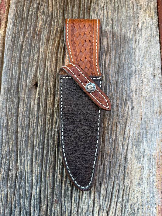 New Randall Model 25-5 Sheath in Exotic Brown Cape Buffalo with full leather hand tooled belt loop. Randall snap and stamp on the back. Custom Made at Sullivan’s by Gutcher