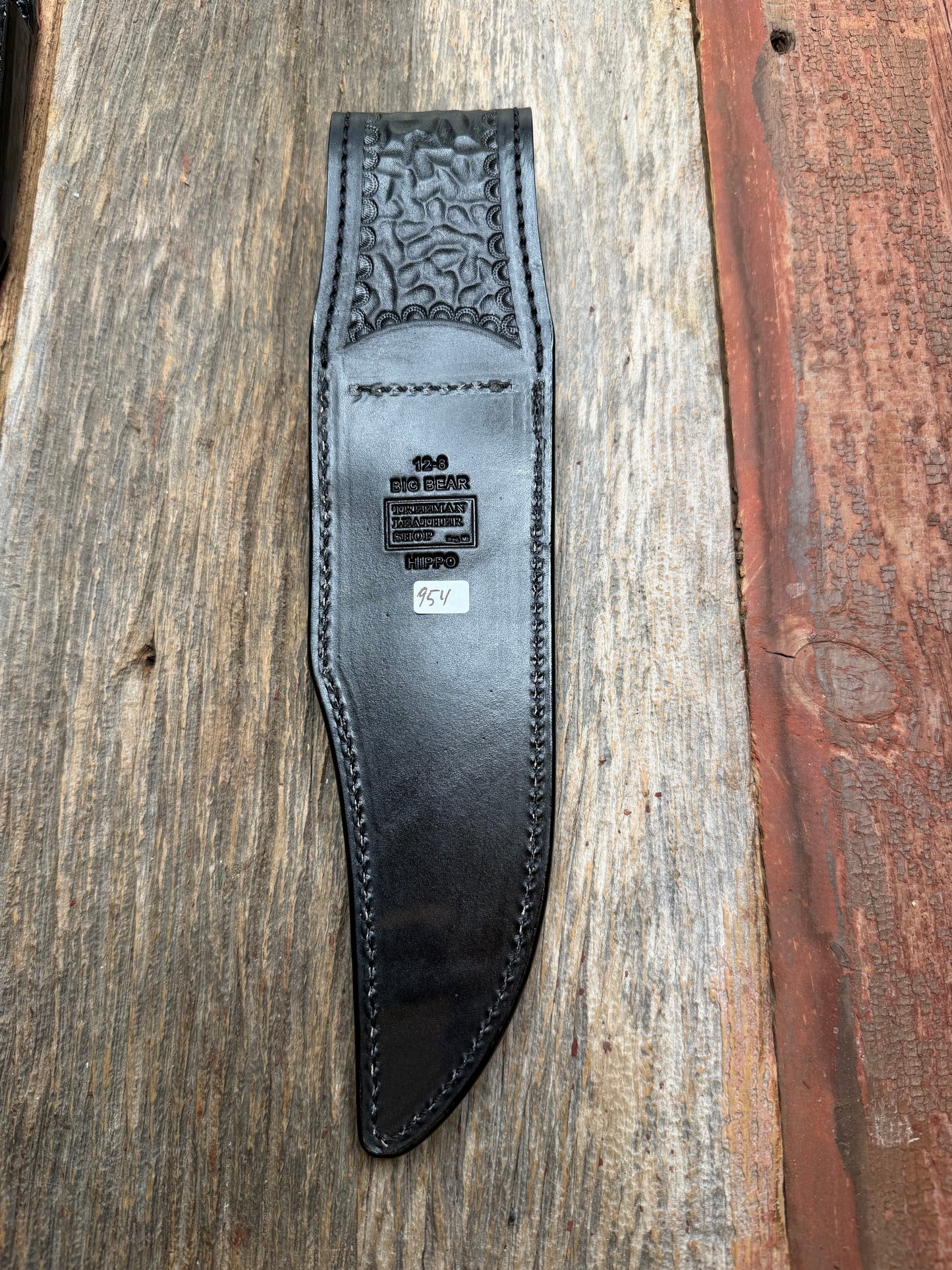 Randall Model 12-8 “Big Bear” in Black Hippo, forward curved hilt, black Canteen Snap, full brass stamping and stitching.