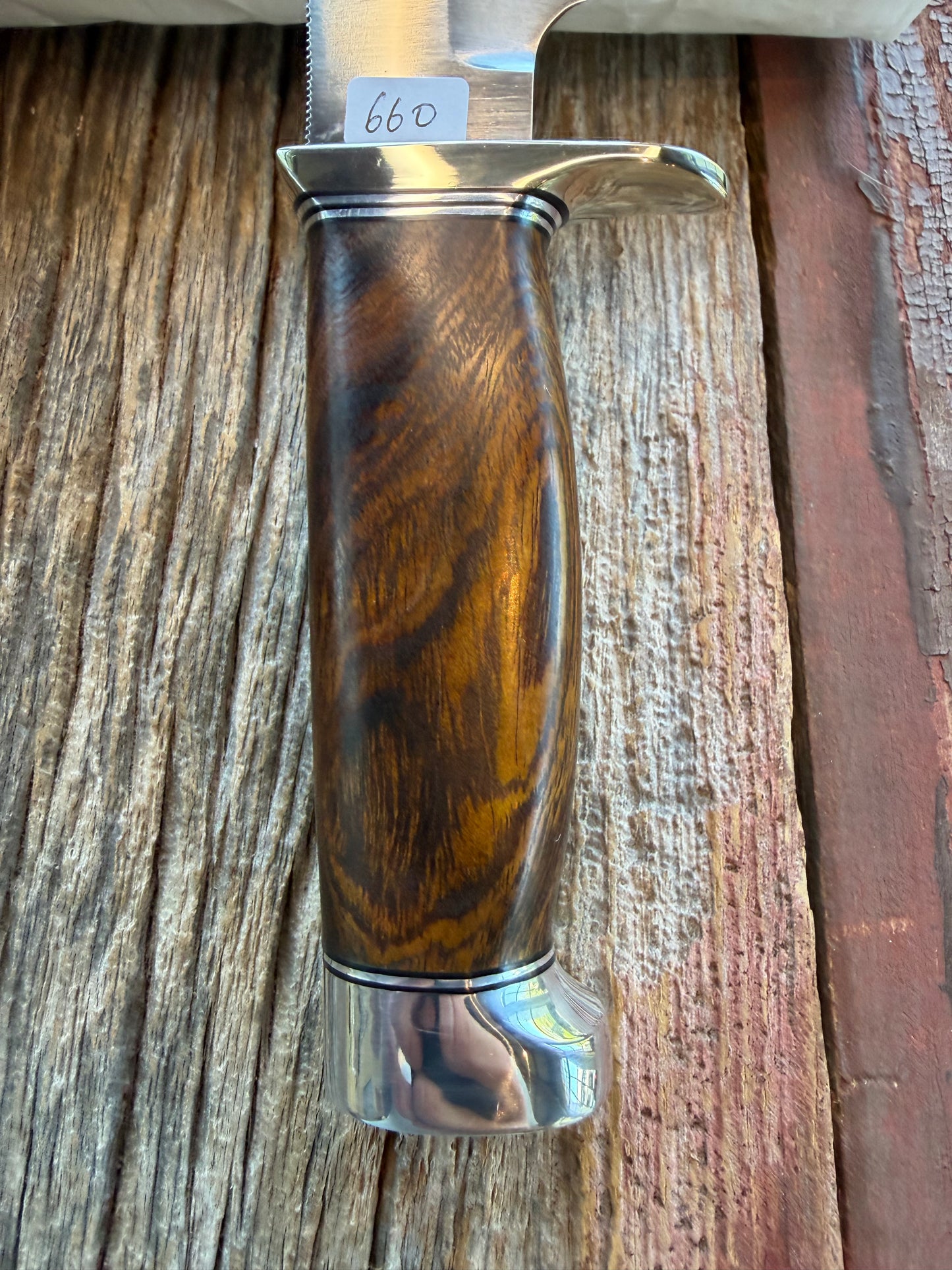 New in Paper Randall Model 19-5 with a nice piece of Ironwood. Nickel silver Hilt and Aluminum crows beak Butt cap.
