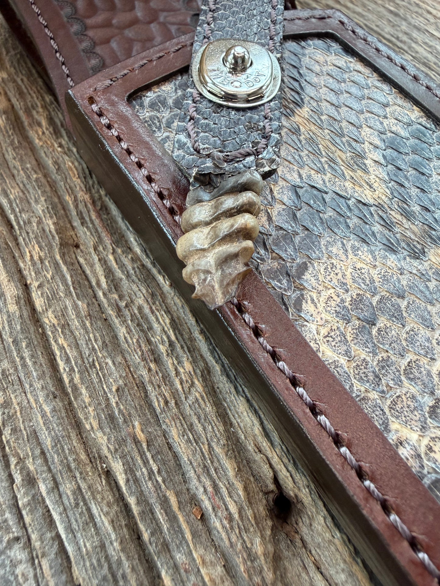 Randall Model 12-11 Smitty Sheath in Exotic Canebreak RattleSnake with the original Rattles tail made into the strap. An absolute gem 1/1 from Treeman Sheaths. Tremendous colors on this one.