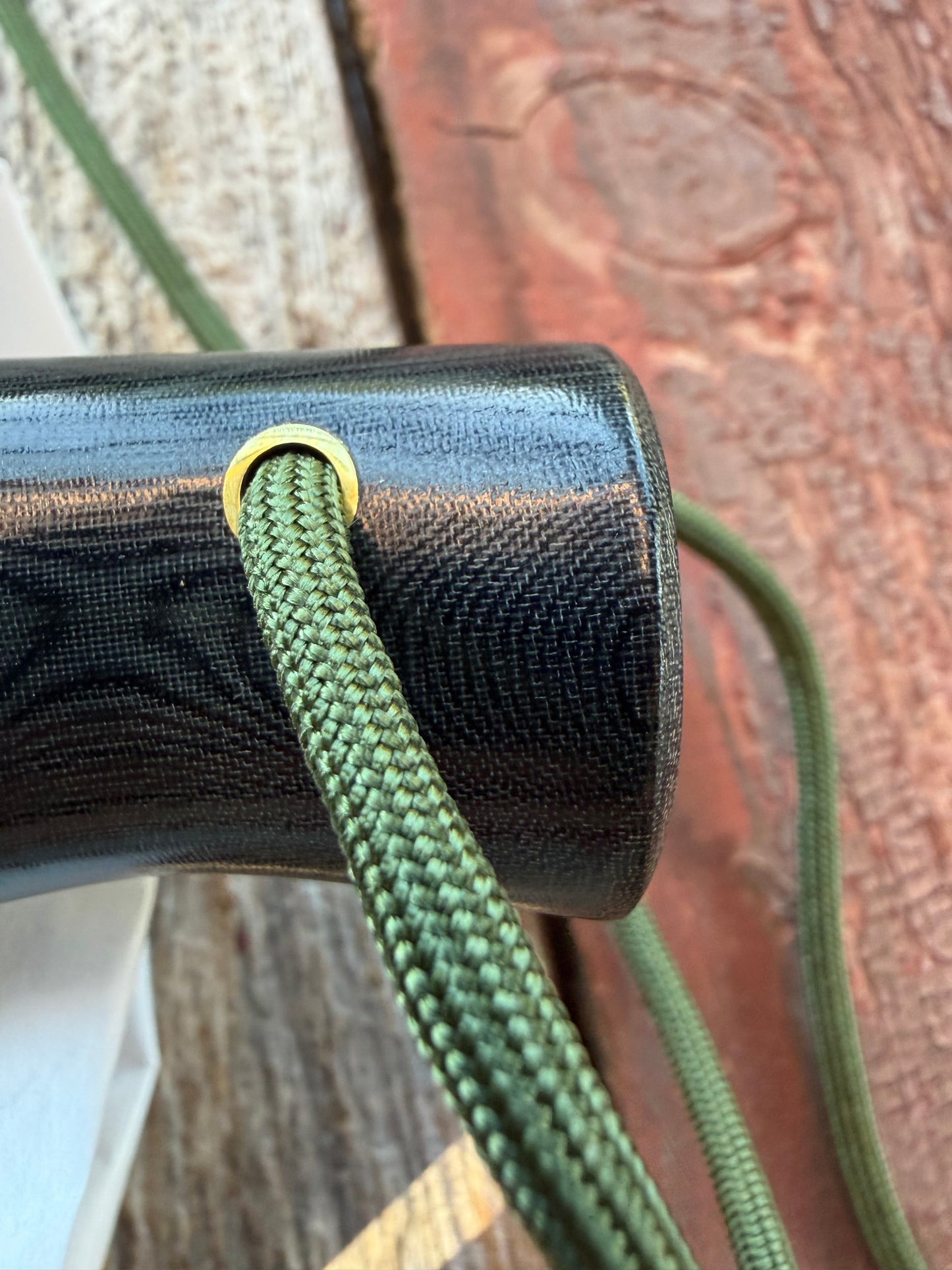 New in Paper Randall Chef’s Knife. Black Micarta in Brass with red spacers. Natural end, stainless steel blade and a lanyard.