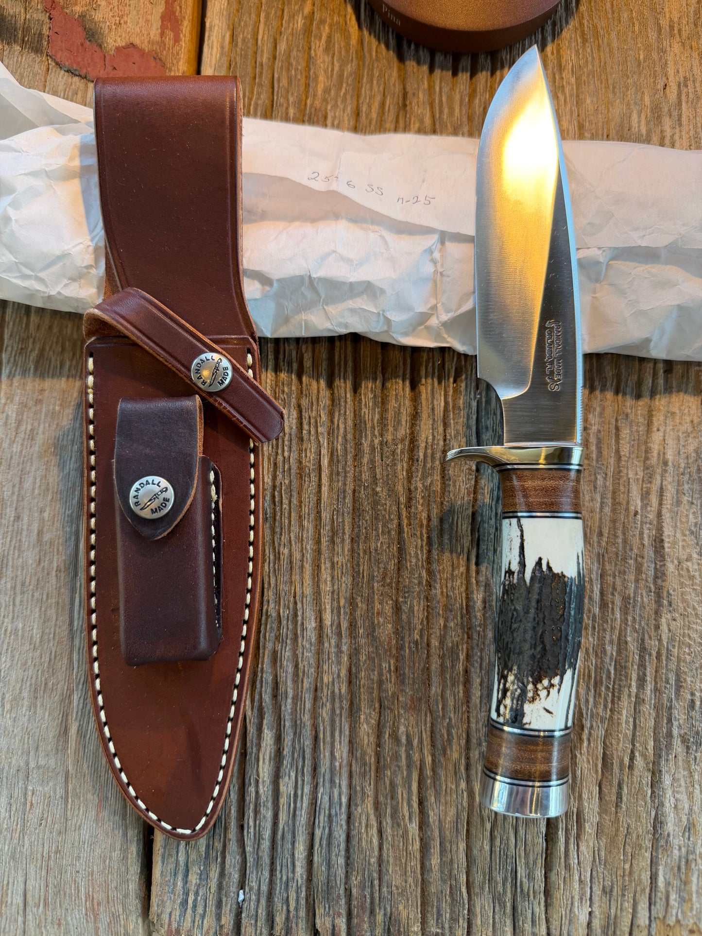 New in paper Randall Knife Model 25-6 Trapper in Stag Leather Handle Stainless Blade, NSH