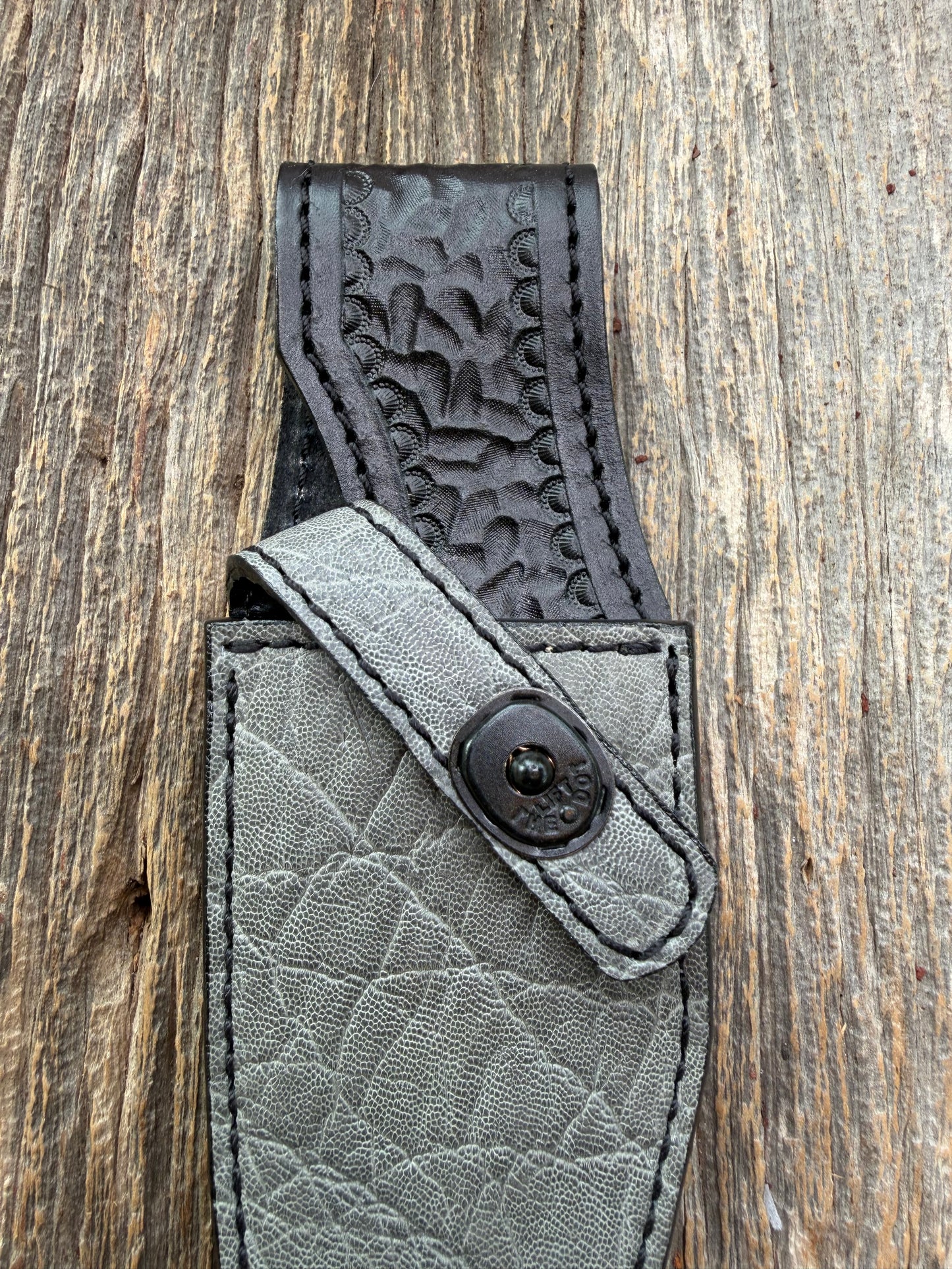 New Randall Model 19-5 Sheath in Exotic thick and textured Grey Elephant Hide on black leather from Treeman with a black Canteen snap. Hand tooled belt loop. Killer sheath.