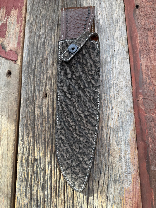 New Randall Model 12-11 Large Sasquatch Sheath in Exotic thick and textured Black and Grey Elephant Ear  on brown leather from Treeman with a black Canteen snap. Hand tooled belt loop. Killer sheath.
