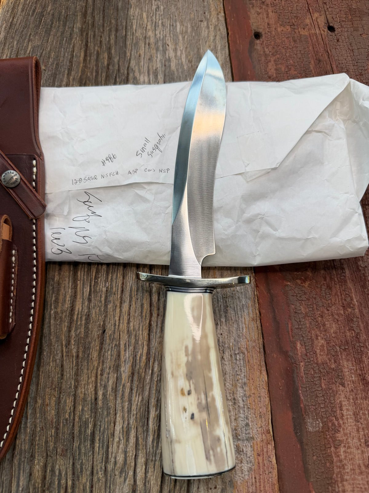 New in Paper Randall Model 12-8 Small Sasquatch with a nice piece of Fossil Walrus Ivory, Nickel Silver Hilt and butt plate.