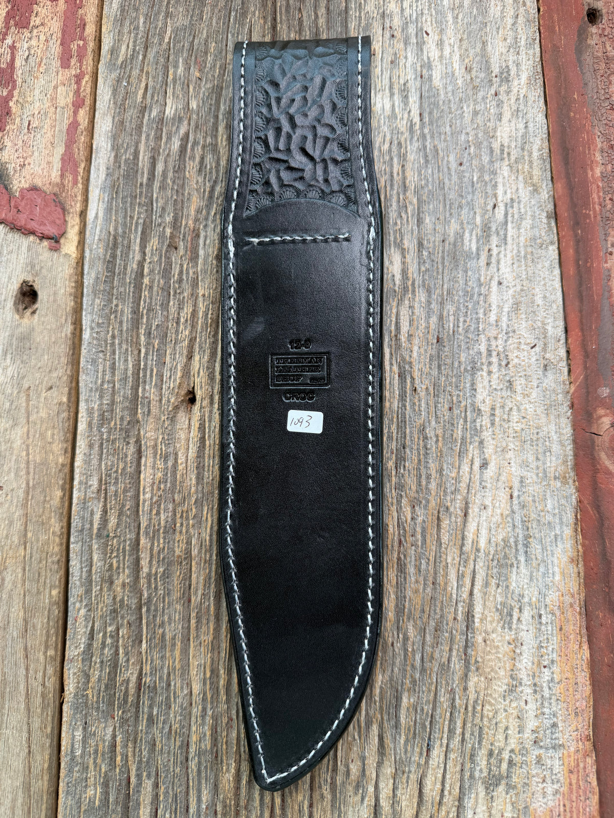 New Randall Model 12-9 Sheath in Exotic Black Matte Crocodile tail from Treeman with a Black Canteen snap. White thread deviated stitching on black leather..Killer sheath.