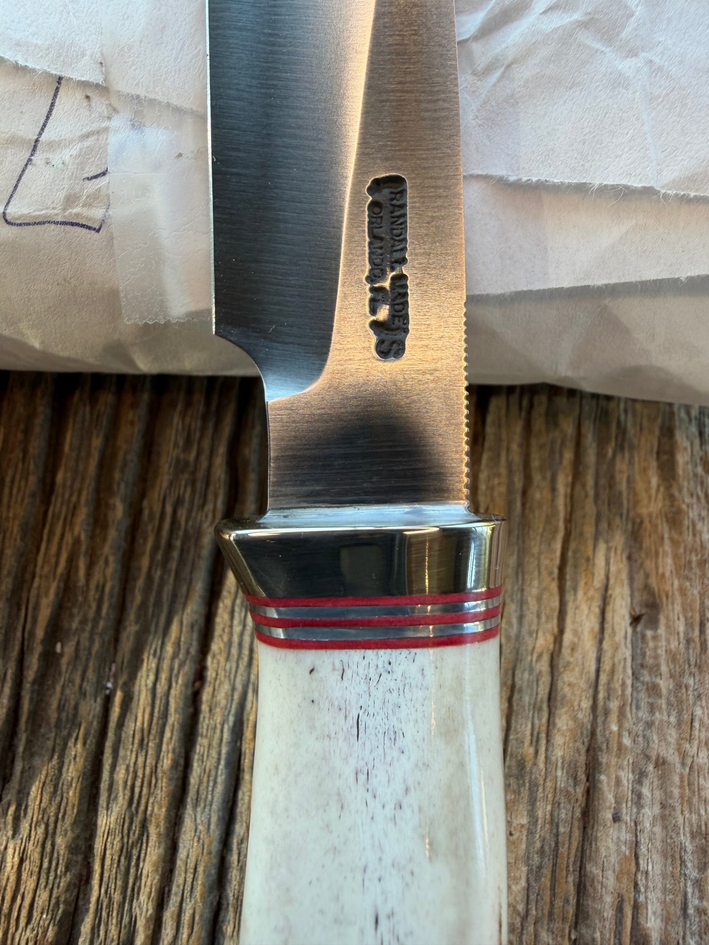 New in Paper Randall Non Catalog Model  Cattleman. Slab side Stag handle. Red and silver spacers. Stainless blade.