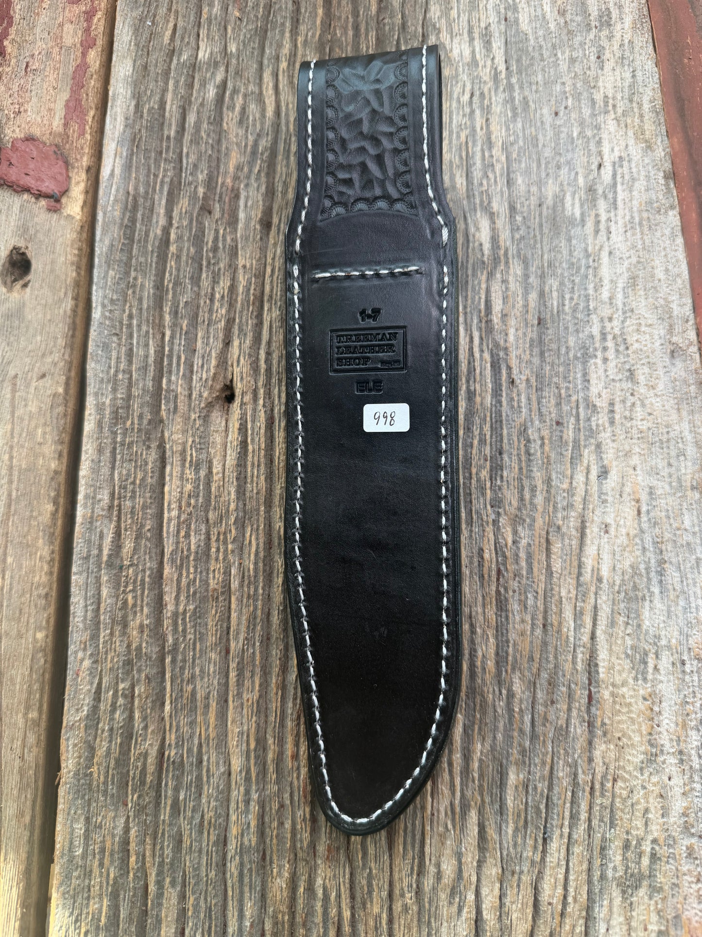 New Randall Model 1-7 Sheath in Exotic thick and textured Black Elephant hide on black leather from Treeman with a black Canteen snap. Hand tooled belt loop. Killer sheath.