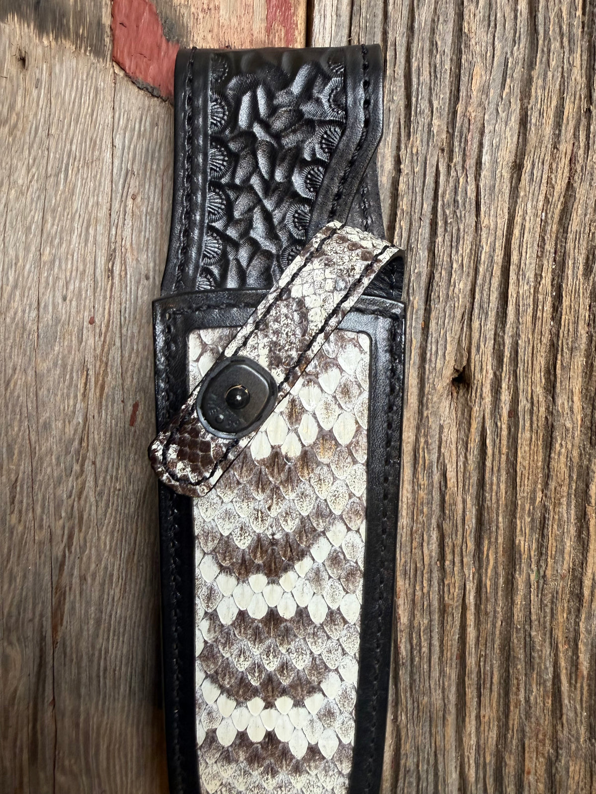 Randall Model Clinton Special sheath with an Eastern Diamondback RattleSnake skin from Treeman Sheaths. Hand tooled belt loop, canteen snap. One the hardest skins to source.