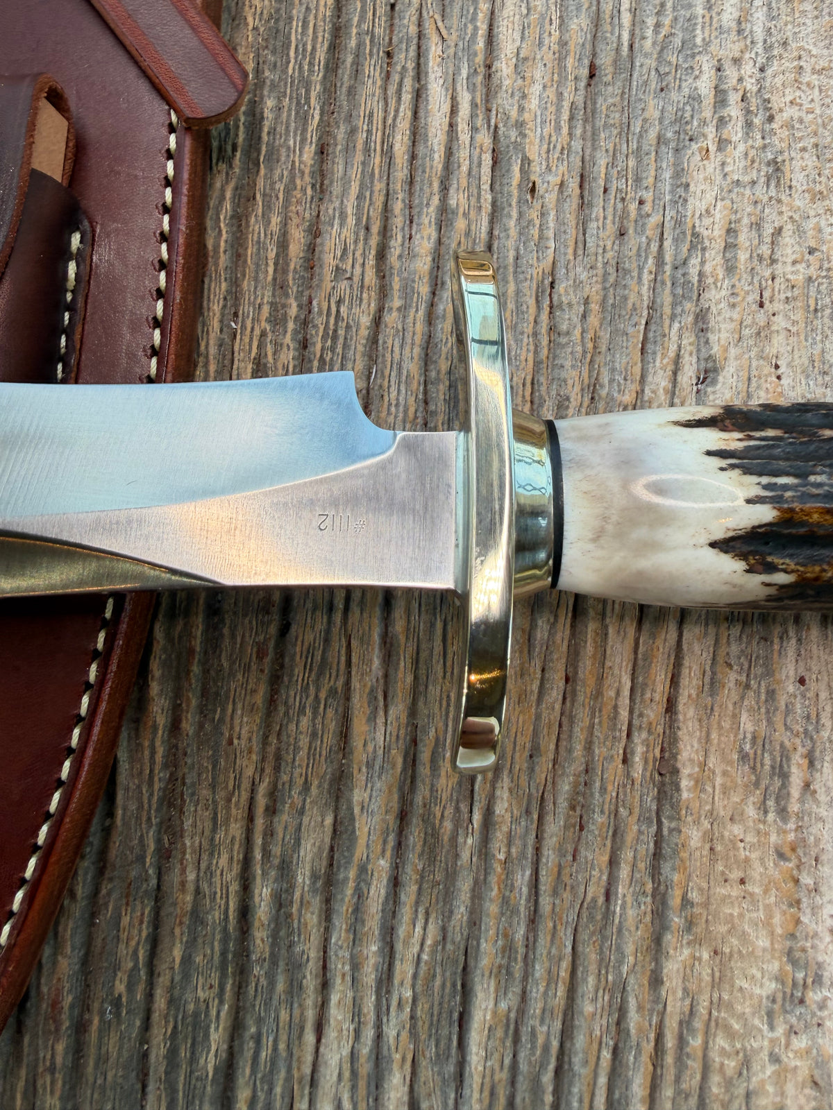 New in Paper Randall Model 12-8 Small Sasquatch with a really nice piece of stag. #1112, Nickel Silver collar and butt cap.