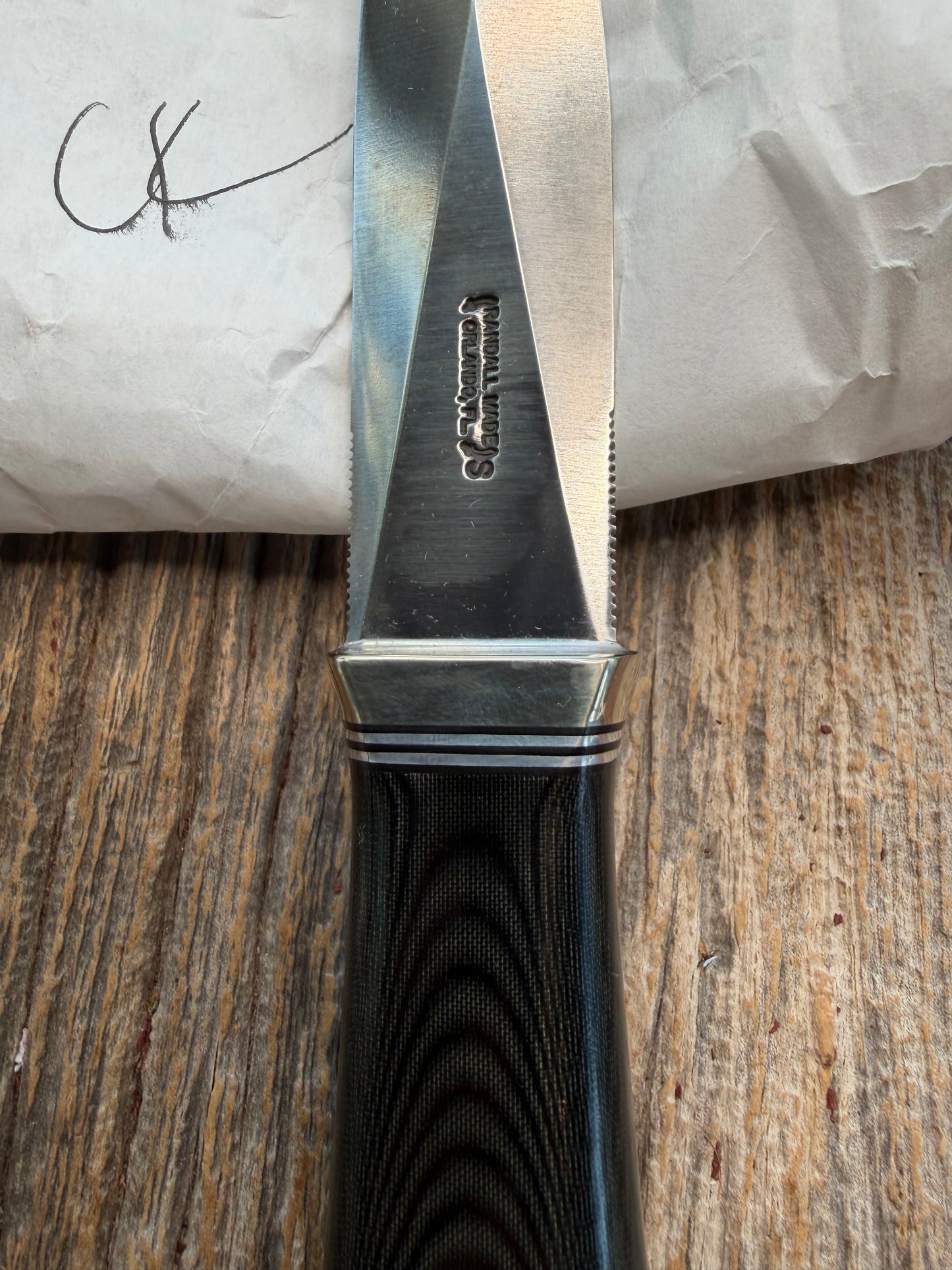 New in Paper Randall Model 24 Guardian in Black Micarta Nickel hilt, Stainless, black and aluminum spacers.