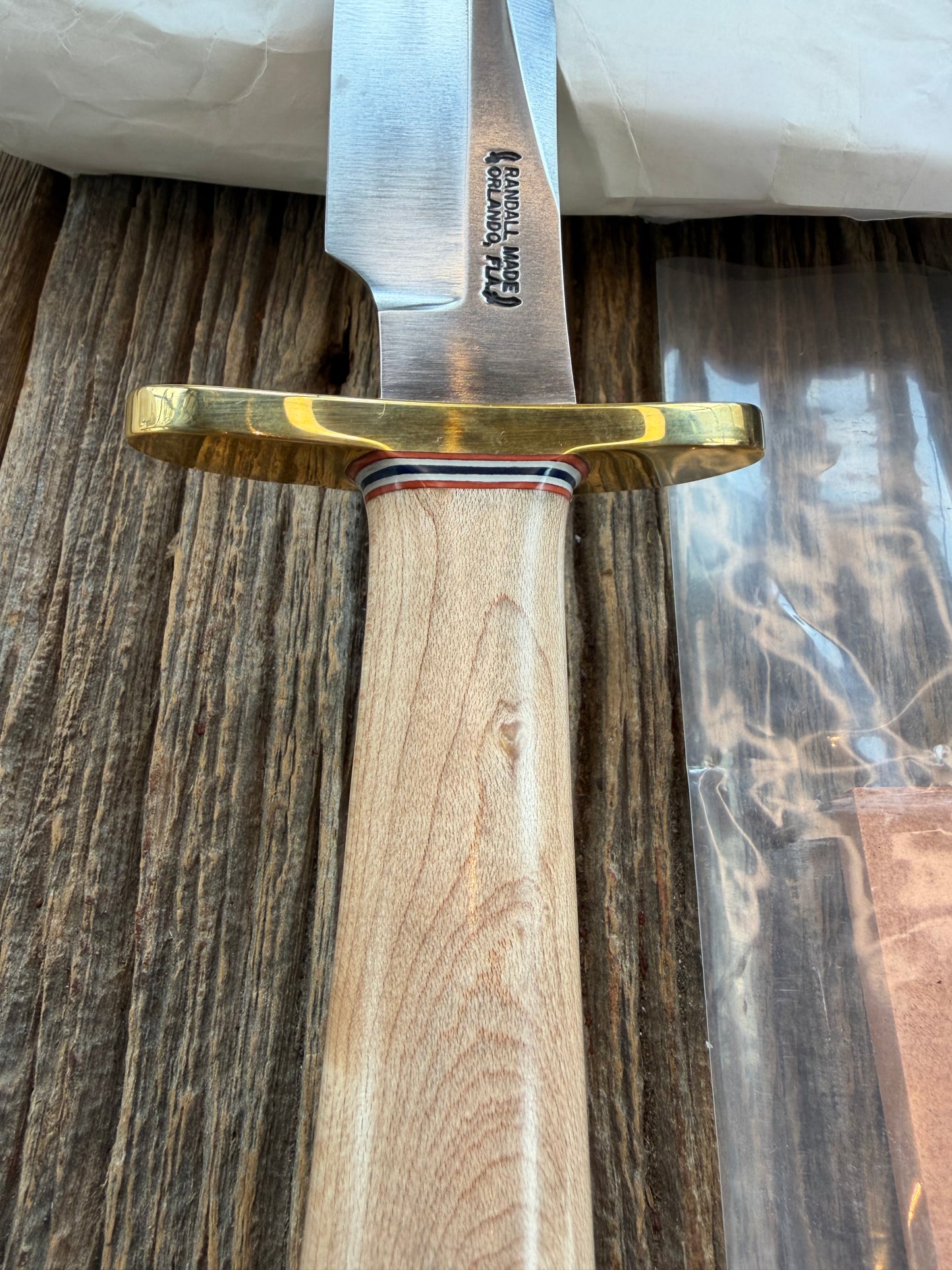 New Paper Randall Made Knife Model 12-6 supplied Maple handle, carbon  blade, brass hilt and rounded butt cap. Red white and blue spacers