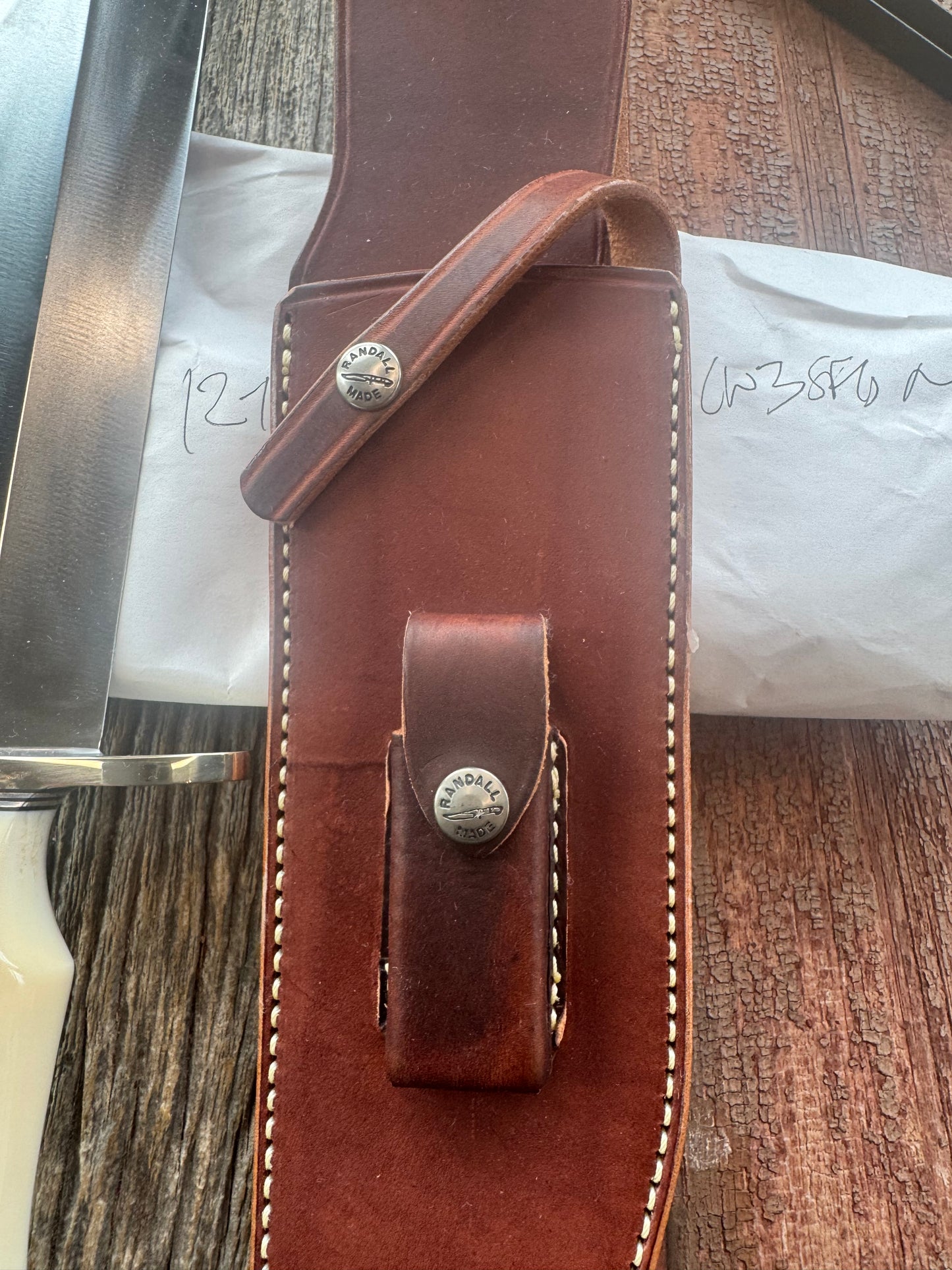 New in Paper Model 12-11 Smithsonian “Smitty” Bowie. Beautiful creamy Fossil Walrus Ivory with a single finger grip and a Nickel  Silver forward curved hilt and butt cap. Unreal Scrim opportunity!! Blank Canvas..