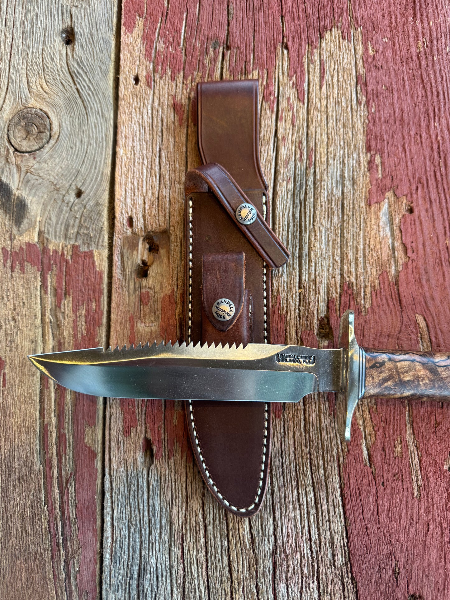 New in paper Randall Knife Model 1-7 Spalted Ebony wood Handle. Carbon Steel Blade, compass and Sawteeth.