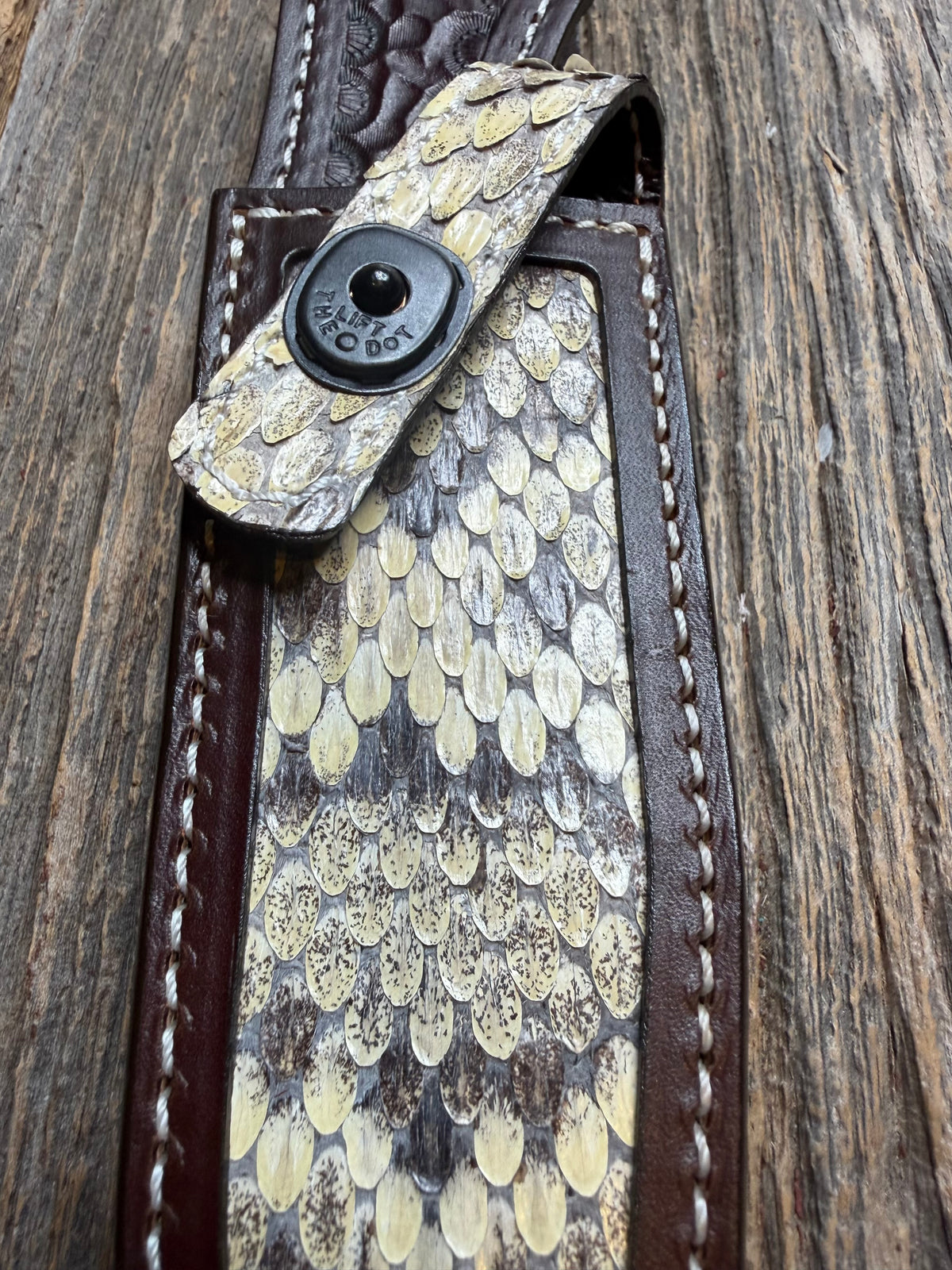 Randall Model 1-6 sheath with an Eastern Diamondback RattleSnake skin from Treeman Sheaths. Hand tooled belt loop, canteen snap. One the hardest skins to source.