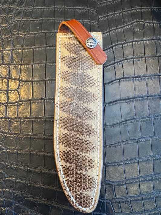 Randall Model 1-7 or 2-7 Exotic Snake skin in a low rise or high boy Sheath from Sullivans by Gutcher.