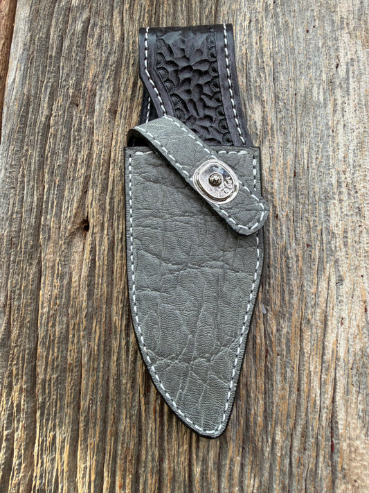 New Randall Model 19-5 Sheath in Exotic thick and textured Grey Elephant Hide on black leather from Treeman with a silver Canteen snap. Hand tooled belt loop. Killer sheath.