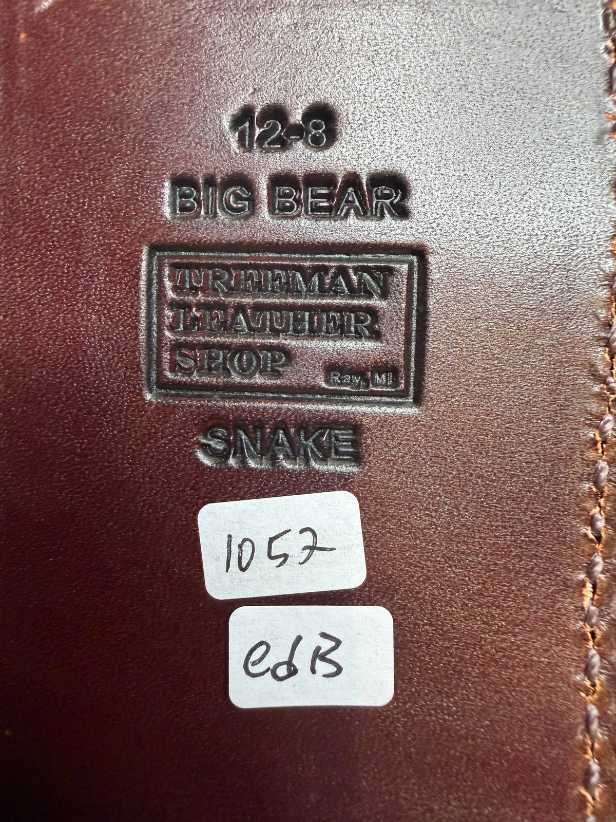 Randall Model 12-8 sheath with an Eastern Diamondback RattleSnake skin from Treeman Sheaths. Hand tooled belt loop, canteen snap. One of the hardest skins to source.