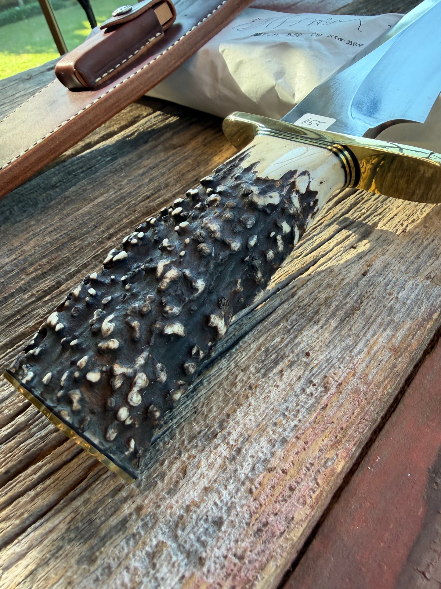 New in Paper Randall Model 12-11 Dealer Special Large Sasquatch with a Huge piece of Popcorn Stag, # 1114 Brass Hilt and butt cap.