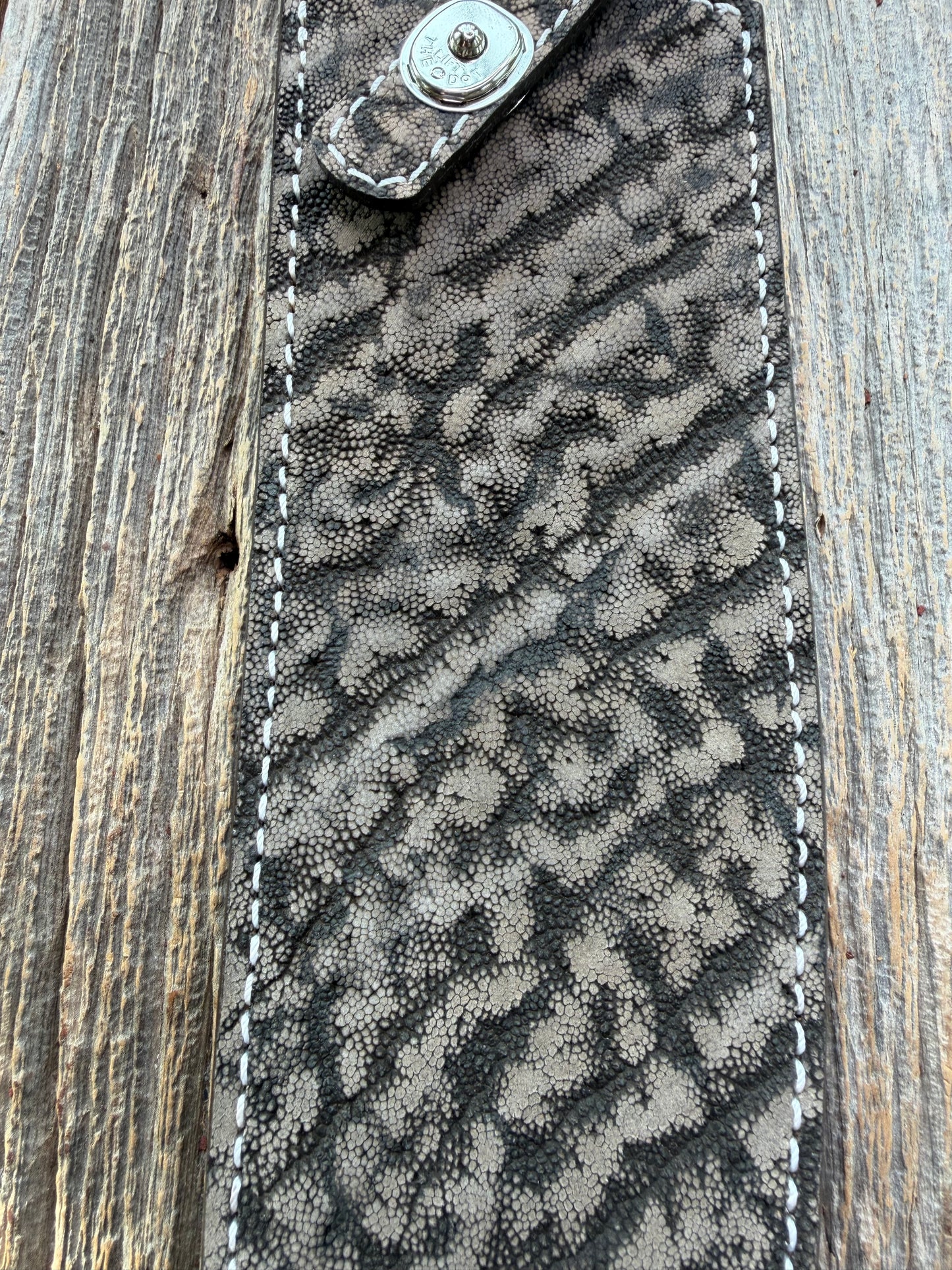New Randall Model 12-11 Large Sasquatch Sheath in Exotic thick and textured Black and Grey Elephant Ear  on brown leather from Treeman with a silver Canteen snap. Hand tooled belt loop. Killer sheath.