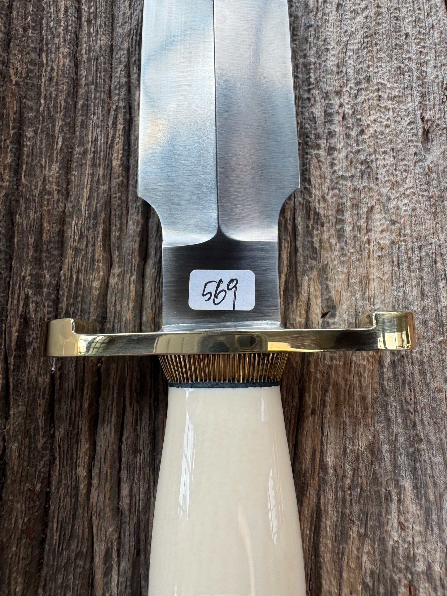 New in paper Randall Clinton Special with a nice piece of customer supplied Warthers Resin with a Stainless Steel blade, lugged Brass Hilt, brass scalloped butt cap and collar.